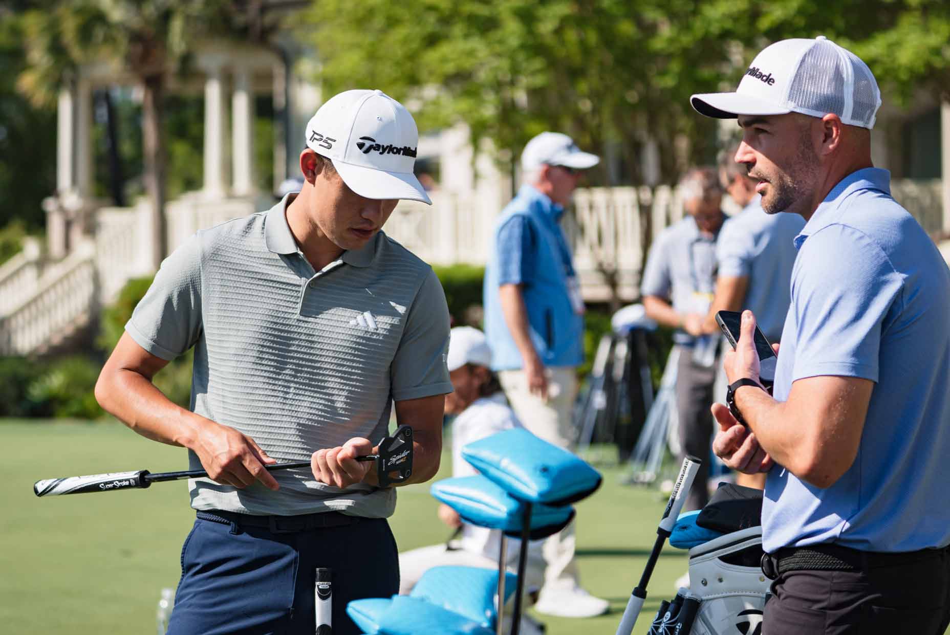 Collin Morikawa with James Holley.