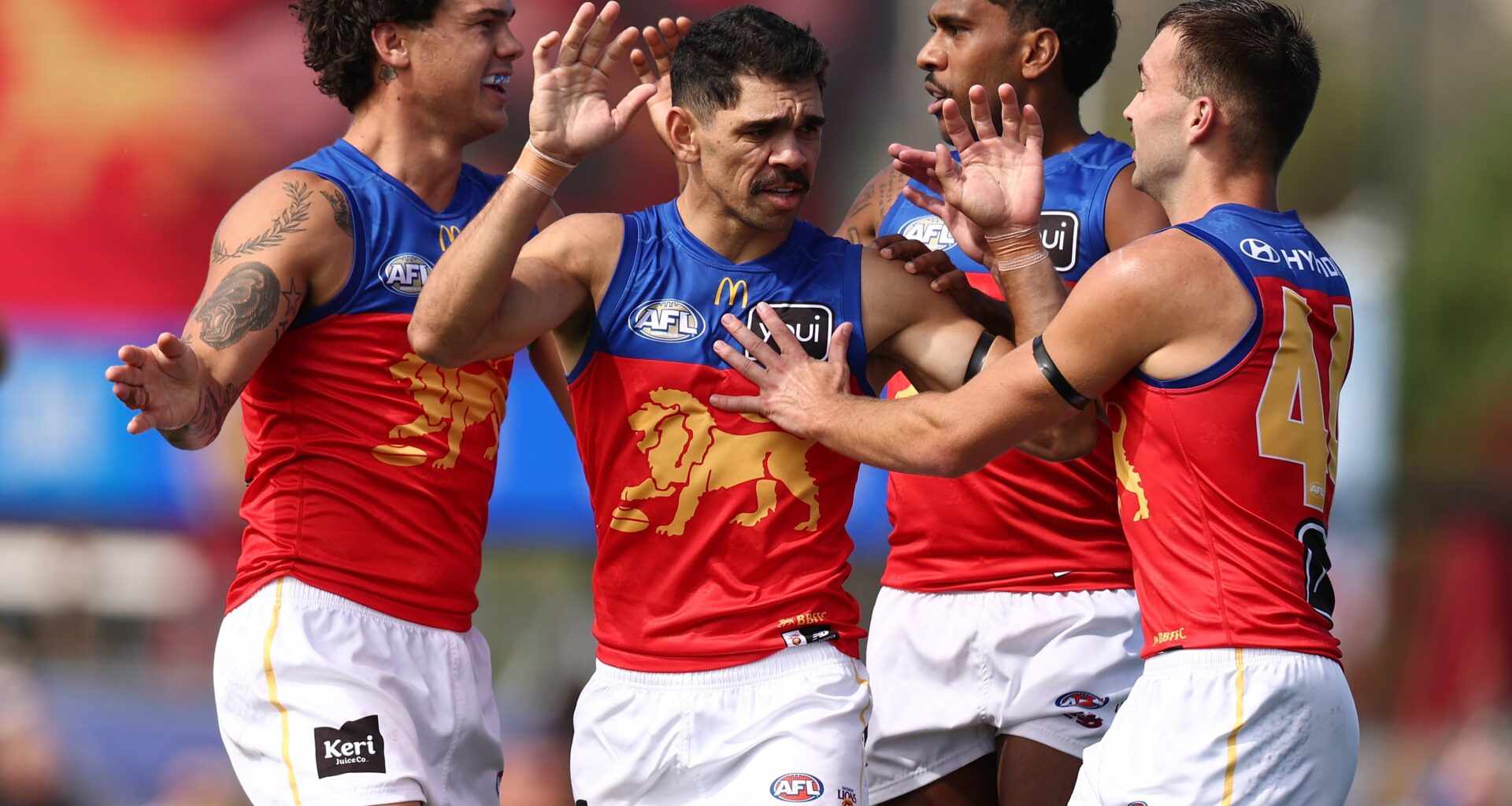Lions fight off Roos' challenge for third straight win