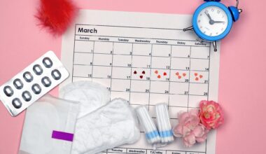 Menstrual pads and tampons by the period of the menstrual cycle on a pink background