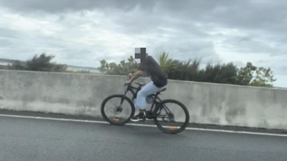 Man caught riding bicycle into oncoming traffic on North Western Motorway