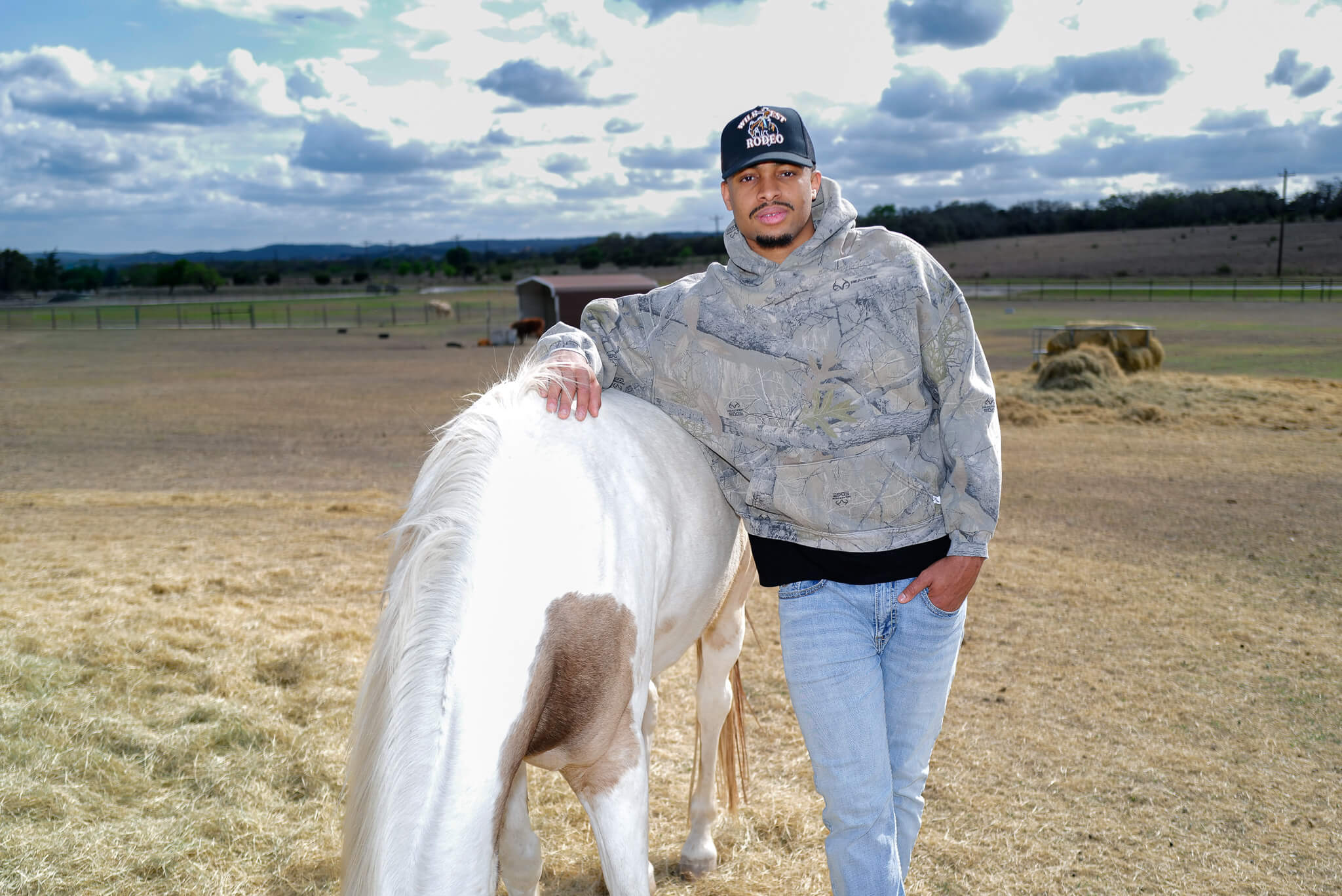 Keldon Johnson with his horse Mu Mu.