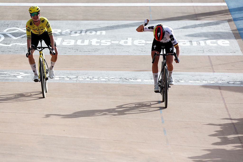 Franziska Koch of Germany and Team FDJ United - SUEZ (R) celebrates at finish line as race winner ahead of Marianne Vos of Netherlands and Team Visma