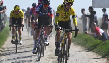 The elite women's peloton, Pauline Ferrand-Prevot, racing on a sunny day at the 2025 Paris-Roubaix Femmes