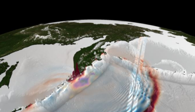 An image showing Earth with ripples over the water where the tsunami is being born.