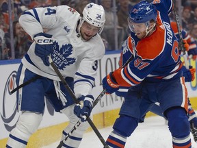 Maple Leafs star forward Austin Matthews, left, is set to face Oilers captain Connor McDavid, right, in Edmonton on Saturday night.
