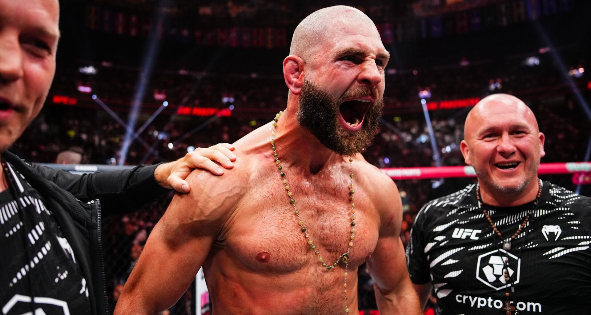 Jiri Prochazka celebrates his win with his team at UFC 320