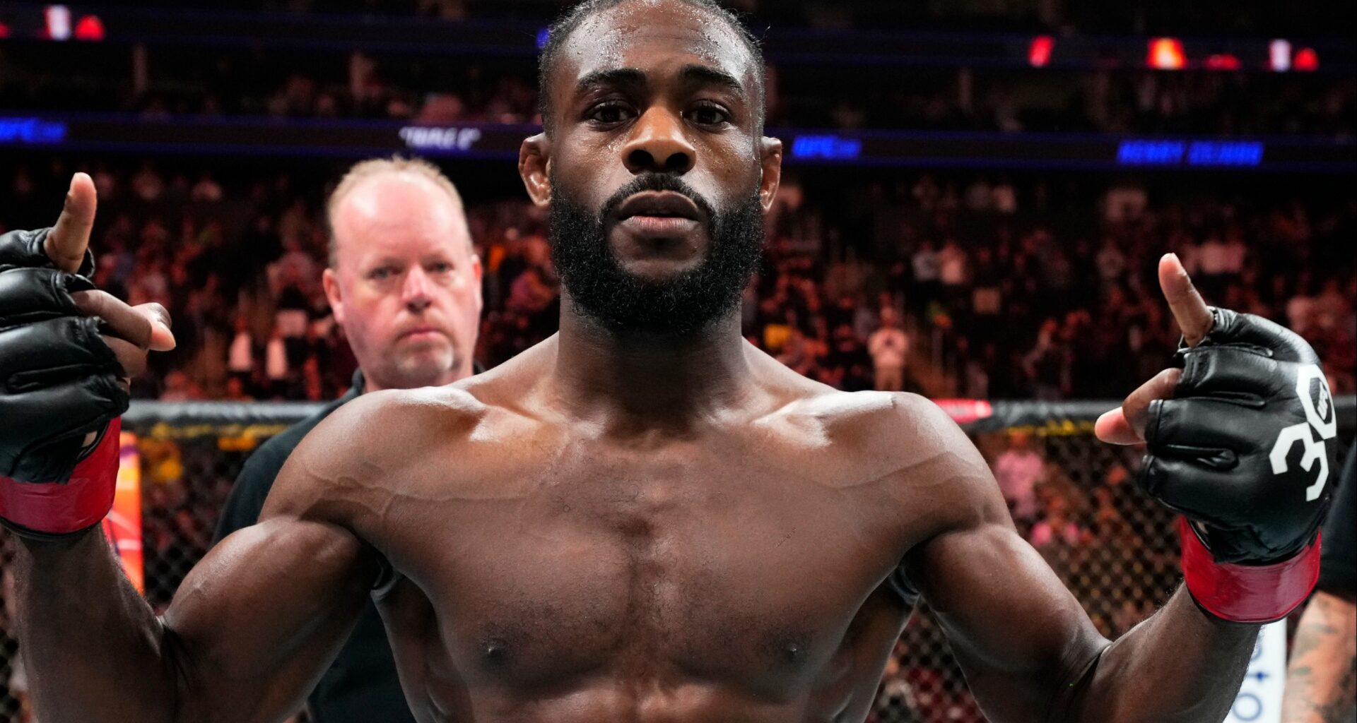 Aljamain Sterling celebrates after UFC 288