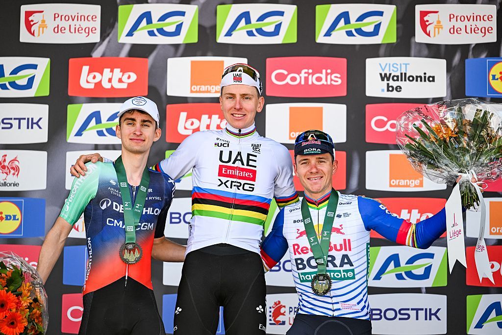 French Paul Seixas of Decathlon CMA CGM Team, Slovenian Tadej Pogacar of UAE Team Emirates-XRG and Belgian Remco Evenepoel of Red Bull-BORA-hansgrohe pictured on the podium after the men elite race of the Liege-Bastogne-Liege