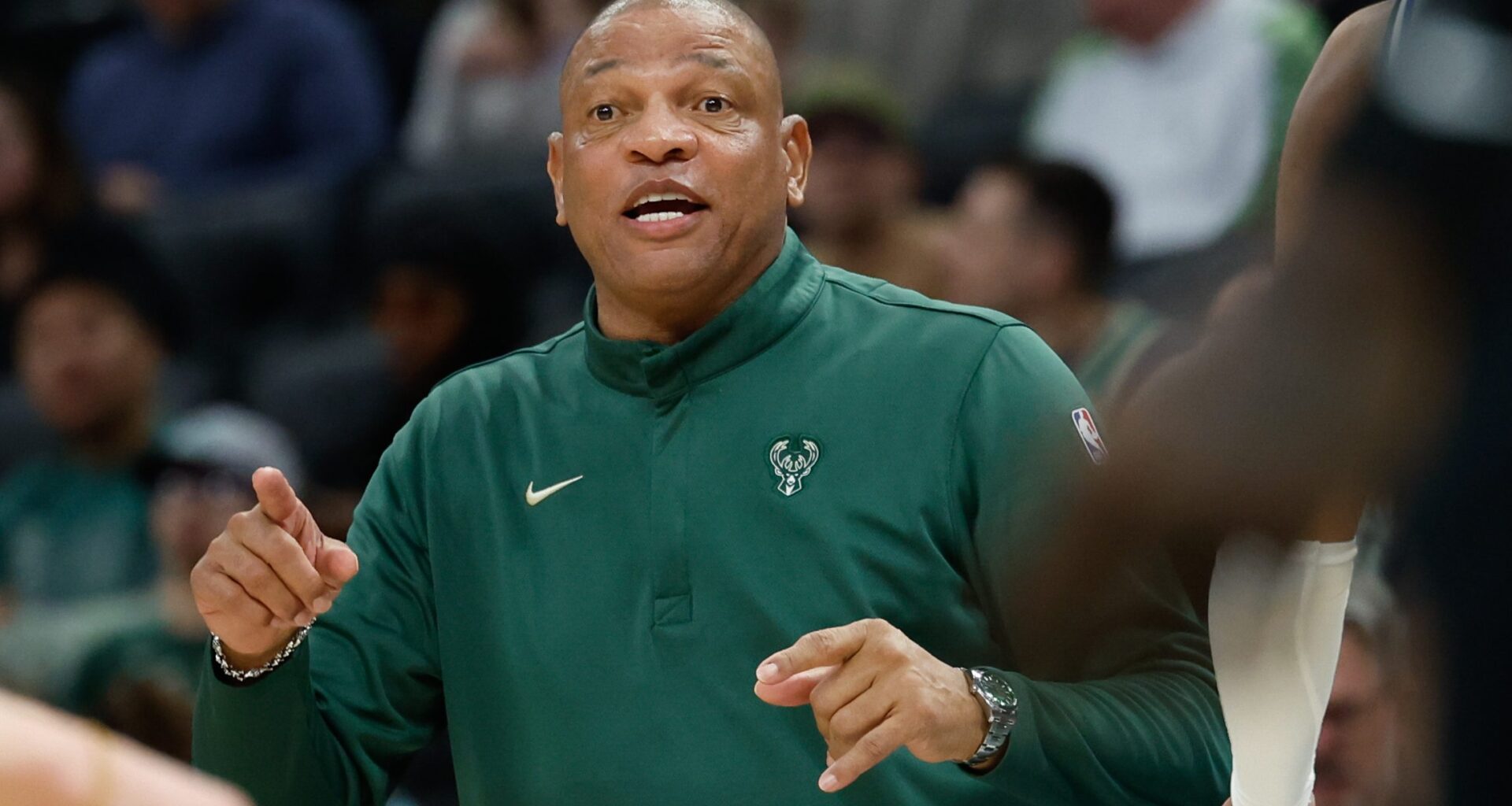Doc Rivers coaches from the sidelines.