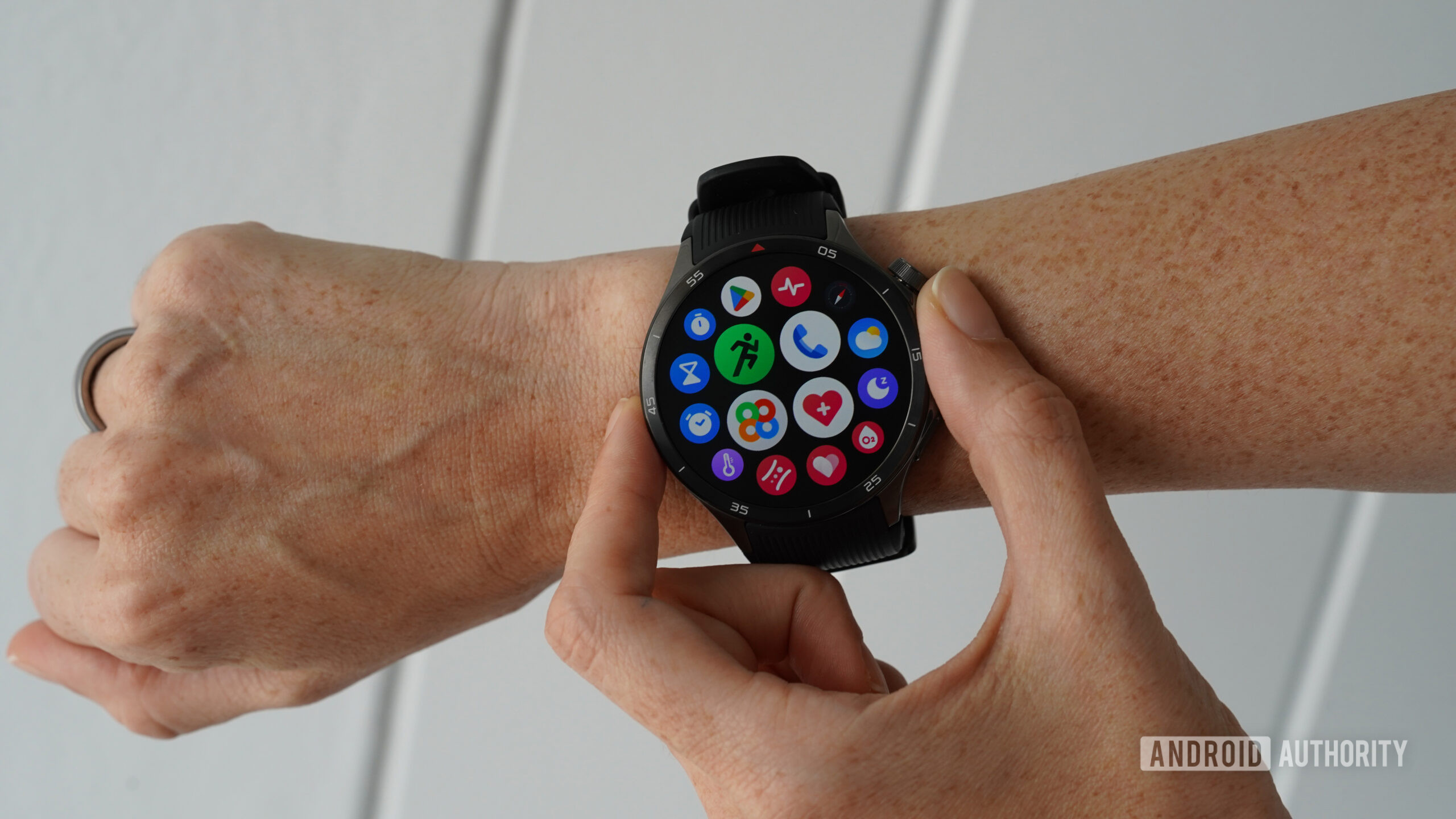 A user browses the app library on their OnePlus Watch 3.