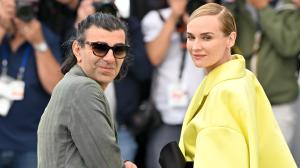 Fatih Akin, Diane Kruger at the “Amrum” Photocall during The 78th Cannes Film Festival at Palais des Festivals on May 16, 2025 in Cannes, France.