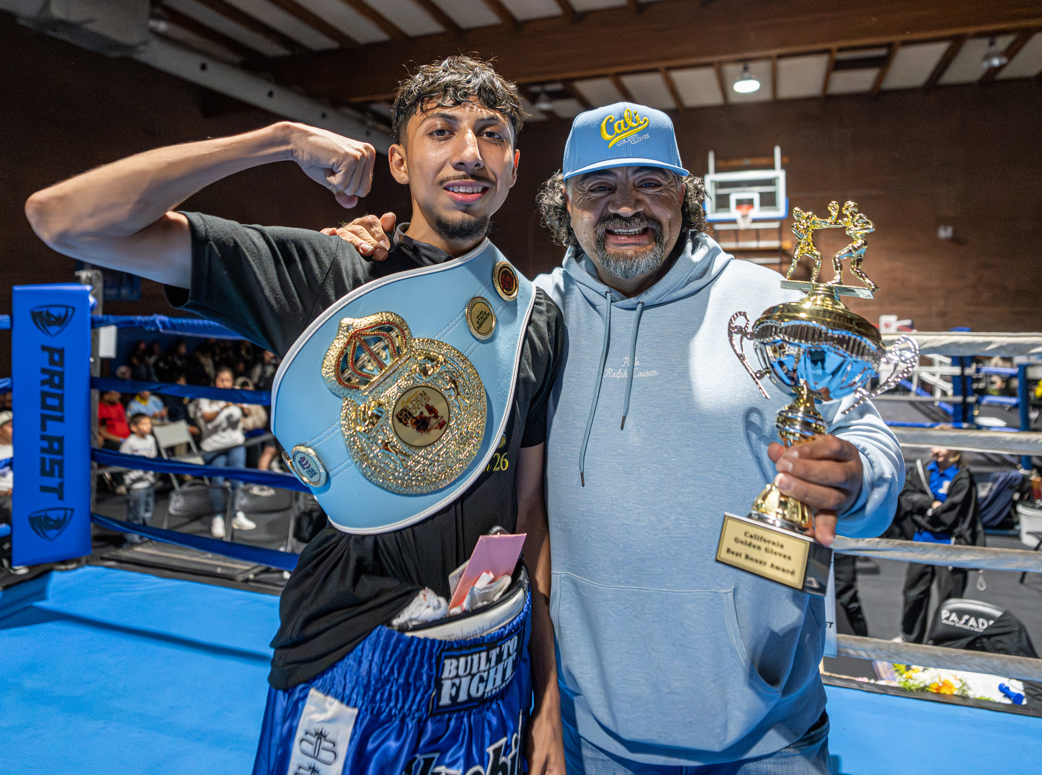 Steven Sierra poses with Fausto De La Torre during the...