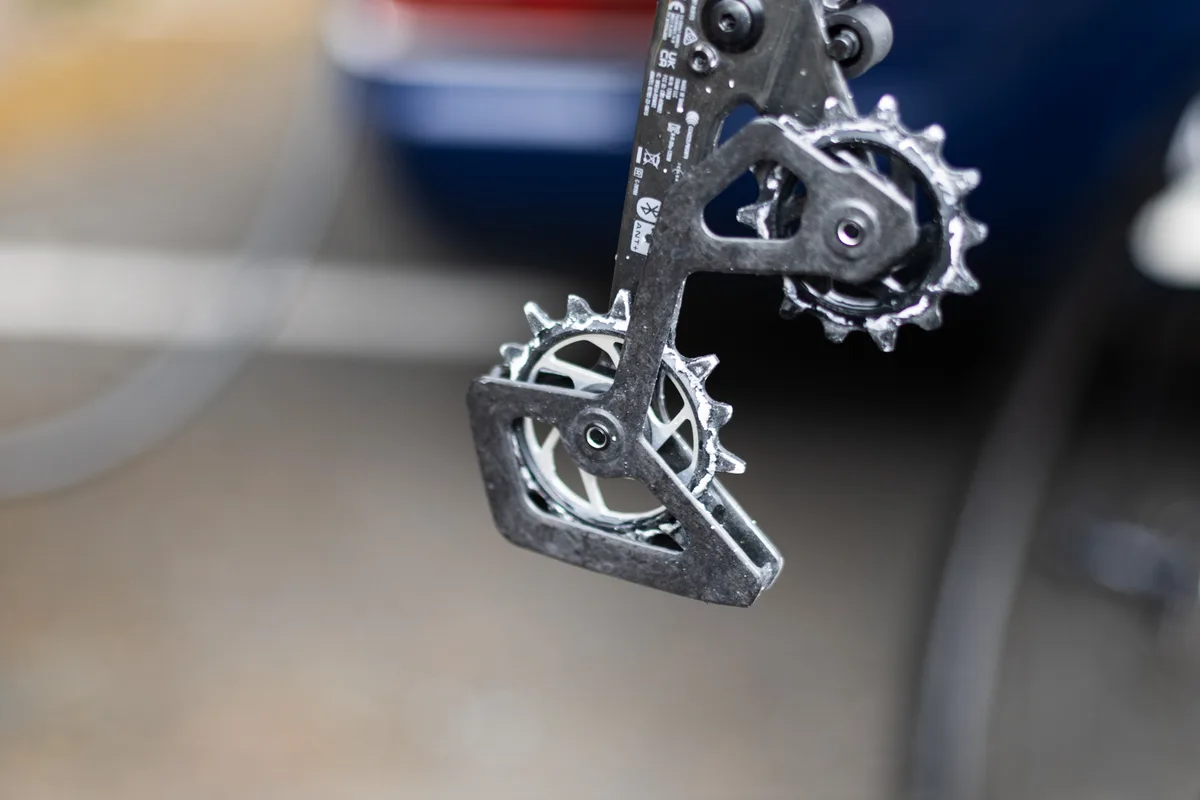 Deposited wax lube on jockey wheels.