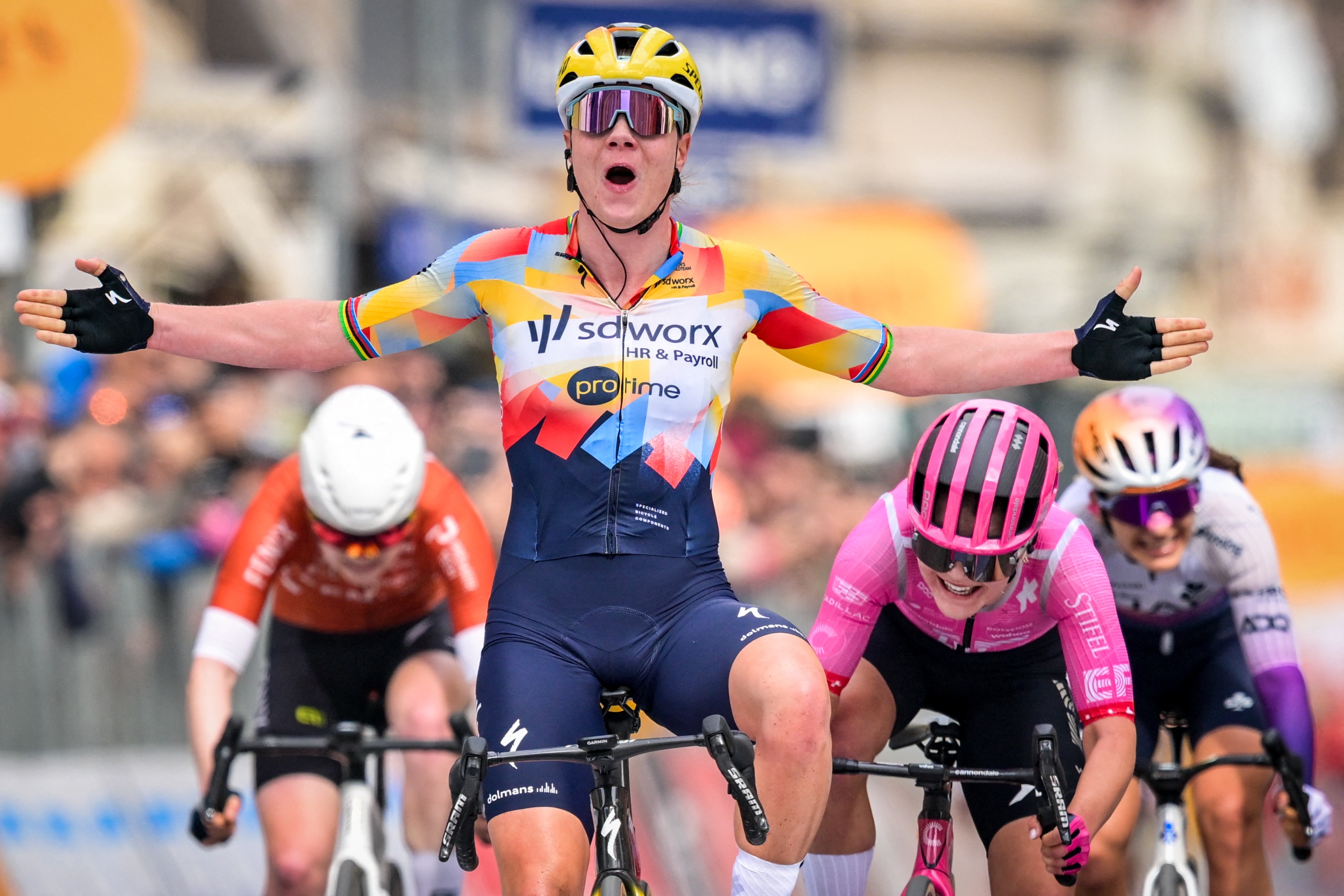 Belgian Lotte Kopecky celebrates as she crosses the finish line to win the 'Milano-Sanremo' one day cycling race for women, 298km from Milan to San Remo, Italy, Saturday 21 March 2026. BELGA PHOTO DAVID PINTENS (Photo by DAVID PINTENS / BELGA MAG / Belga / AFP via Getty Images)