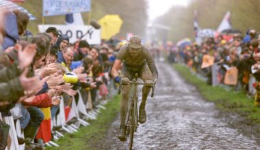 A muddy Wilfried Peeters races through the Arenberg Forest during the 2001 Paris-Roubaix, one of the iconic editions in the recent history of the race