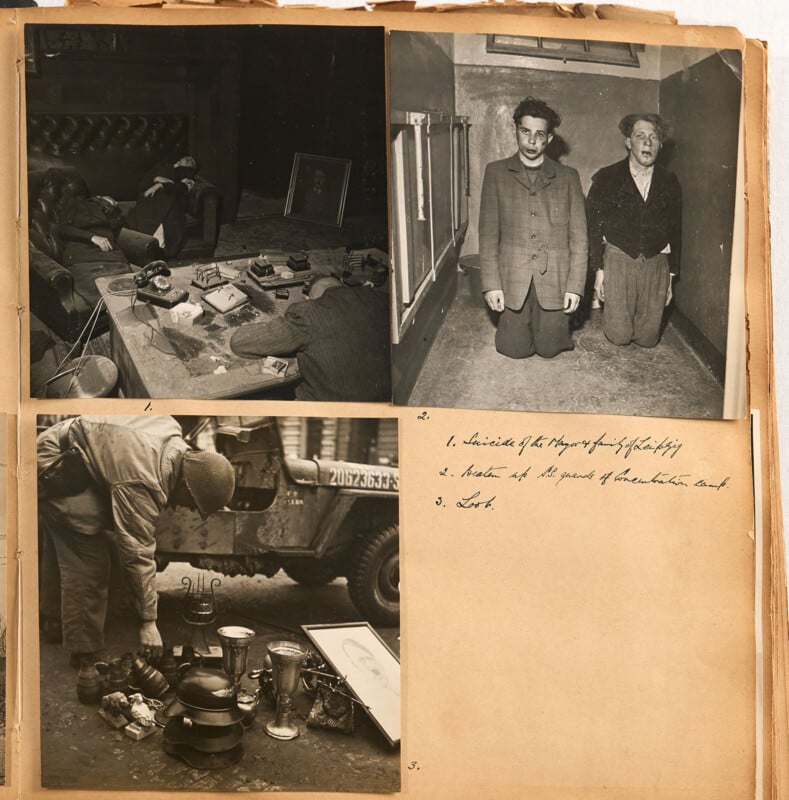 A scrapbook page displays three black-and-white photographs: two men lying over a desk, two men kneeling against a wall, and a soldier inspecting assorted items on the street. Handwritten notes appear on the right.