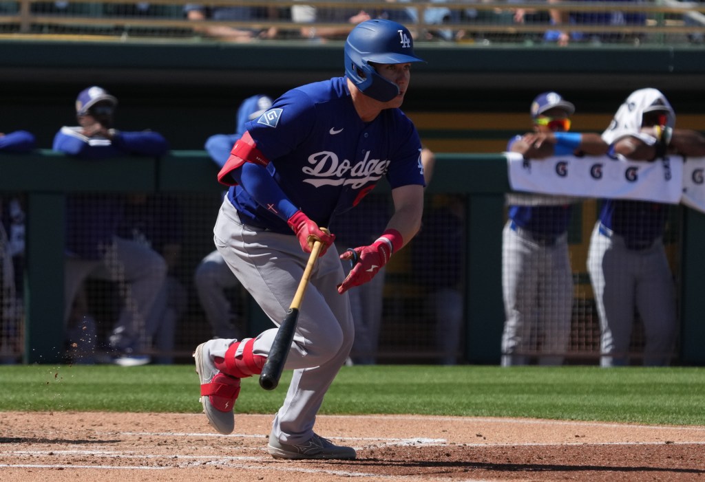 Dodgers outfielder Ryan Ward, who is getting his first MLB call-up at age 28, hits an RBI double during a spring training game against the A's on March 8, 2025.