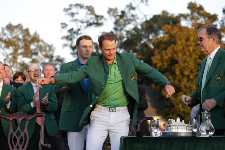 Master Champion Danny Willett of England and Masters champion Jordan Spieth during the Green Jacket Presentation at Augusta National Golf Club on Sunday April 10, 2016. (Photo by Hunter Martin/Augusta National via Getty Images)