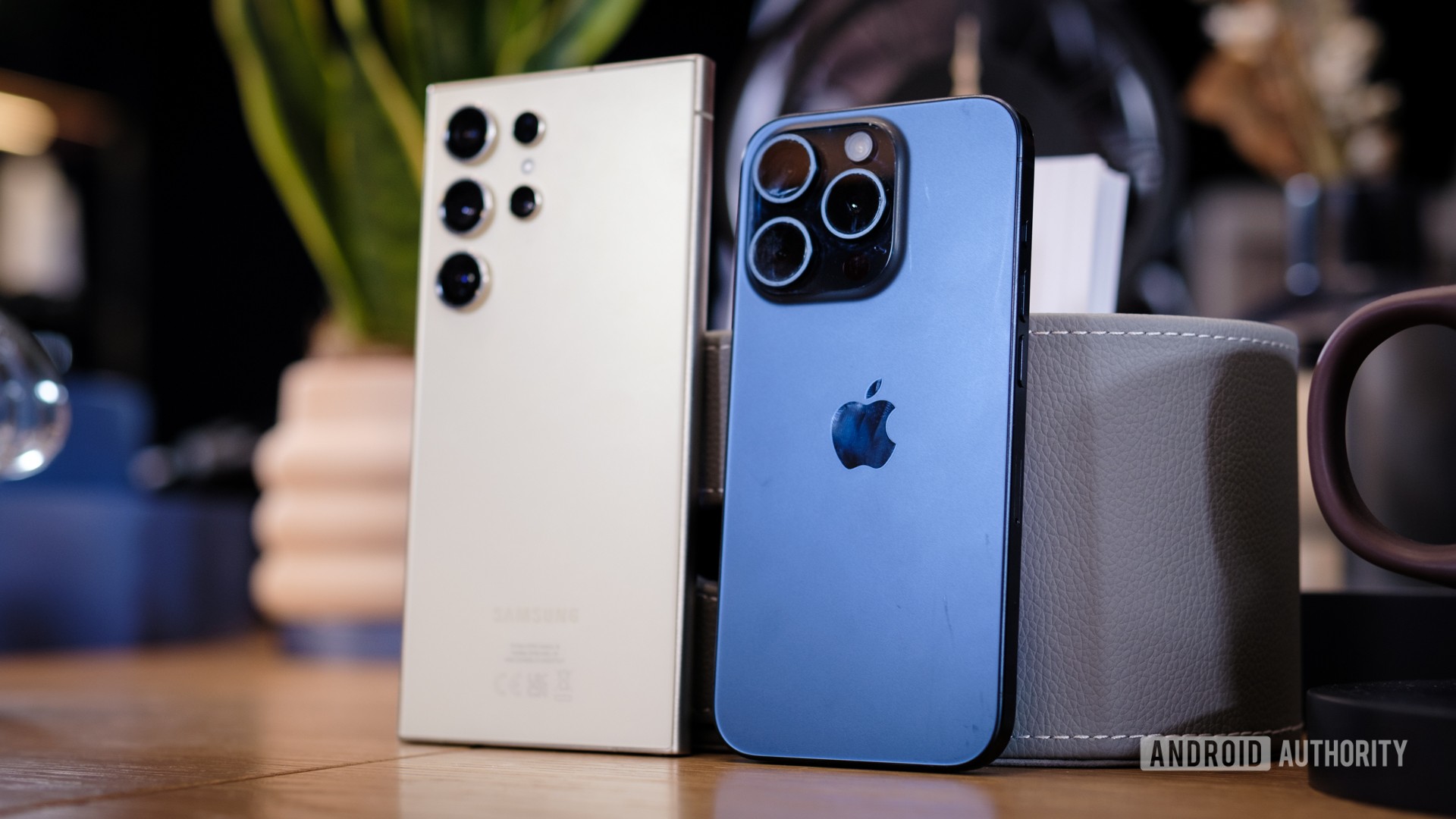 Samsung Galaxy S24 Ultra vs Apple iPhone 15 Pro backs standing Samsung Galaxy S24 Ultra vs Apple iPhone 15 Pro backs standing