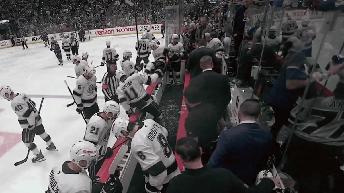 NHL Coach showered with broken glass from fan during playoff game