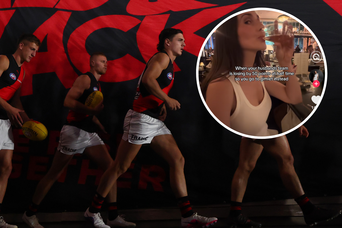 Essendon captain responds to 'unusual' in-game post from Zach Merrett's wife
