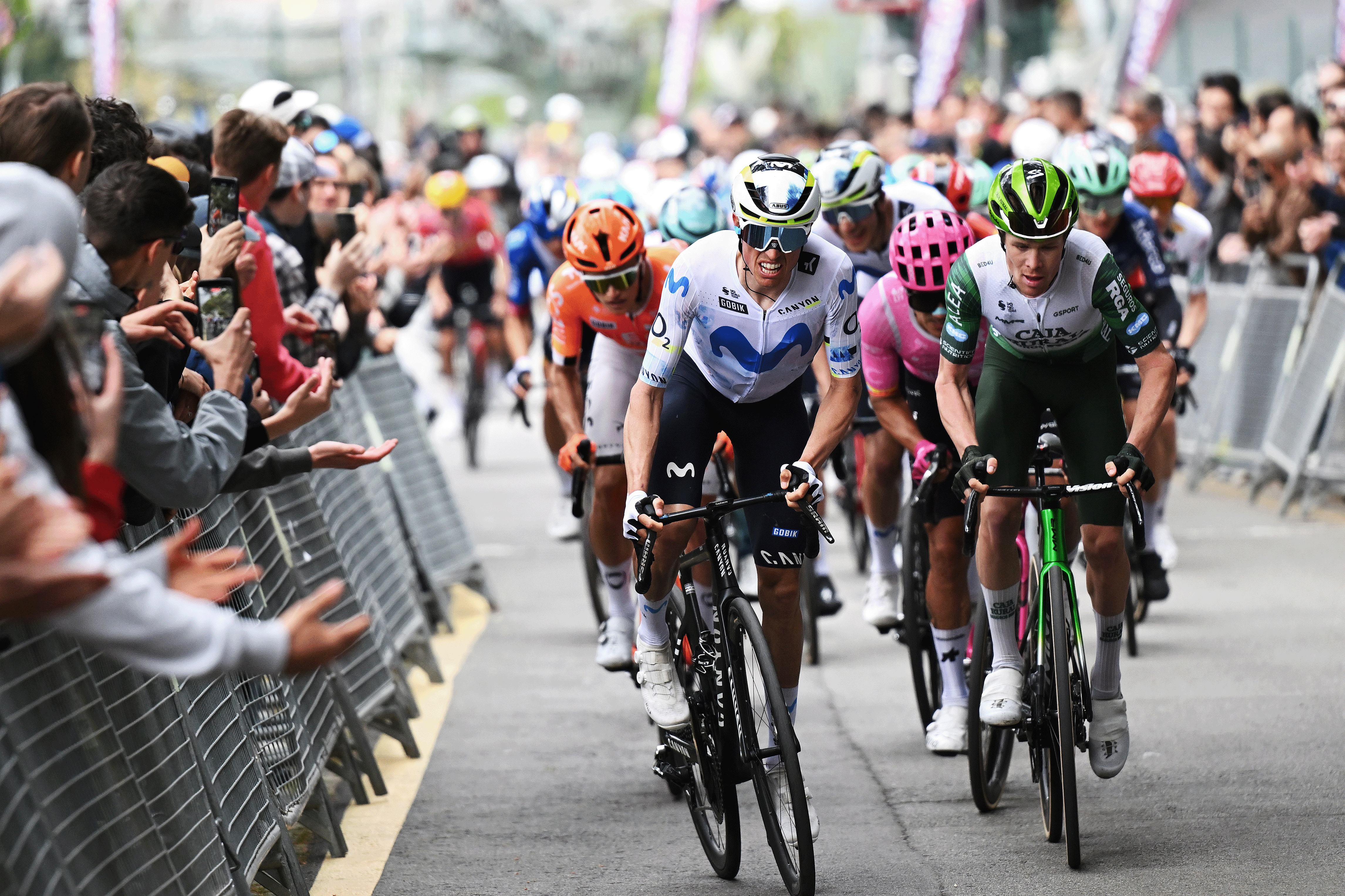 BARCELONA, SPAIN - MARCH 29: (L-R) Enric Mas of Spain and Team Movistar and Sebastian Berwick of Australia and Team Caja Rural - Seguros RGA compete during the 105th Volta a Catalunya 2026, Stage 7 a 95.1km stage from Barcelona to Barcelona / #UCIWT / on March 29, 2026 in Barcelona, Spain. (Photo by Szymon Gruchalski/Getty Images)