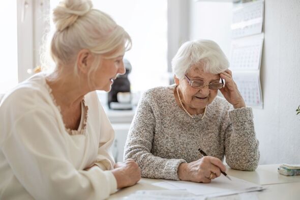 Two women looking at IHT changes