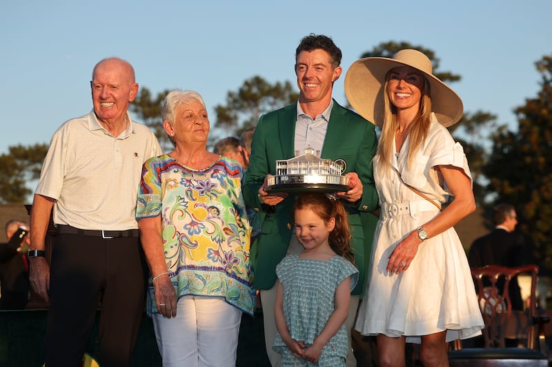 Rory McIlroy with his father Gerry, mother Rosie, wife Erica and daughter Poppy after winning  the final round of the 2026 Masters Tournament on Sunday. Photograph: Hector Vivas/Getty Images