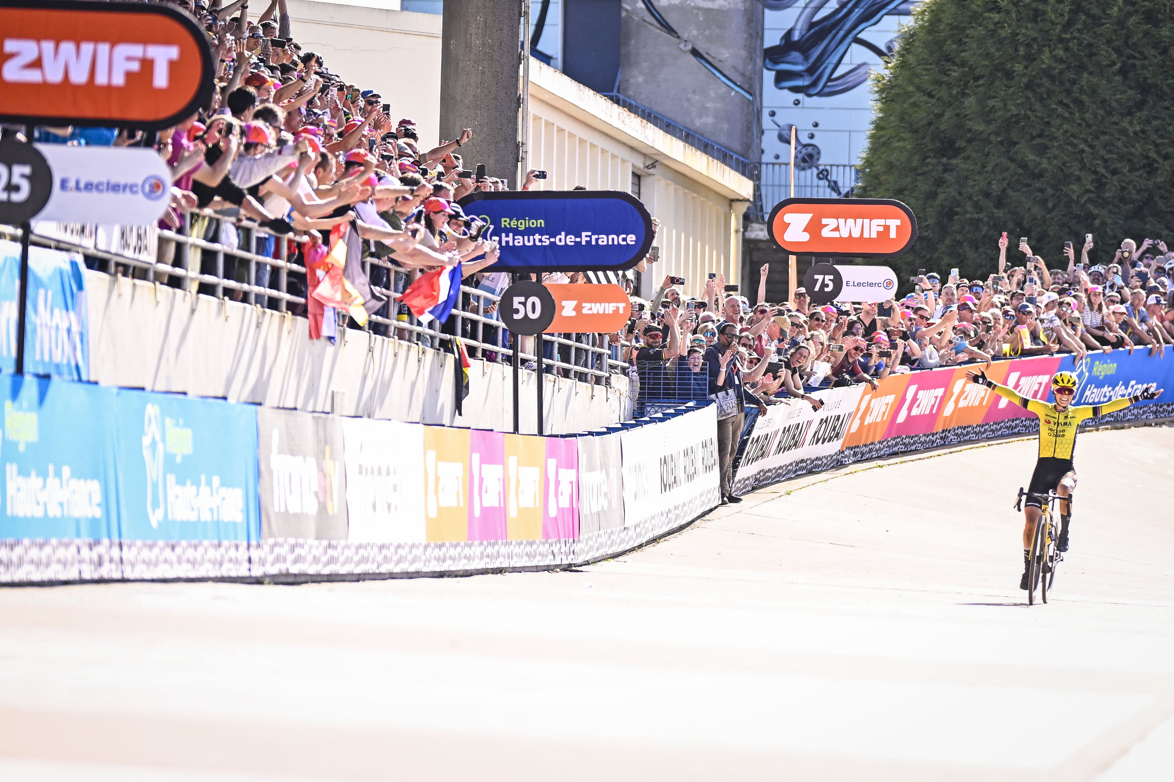 Pauline Ferrand=Prevot crosses the finishline in the velodrome at Paris-Roubaix Femmes in 2025