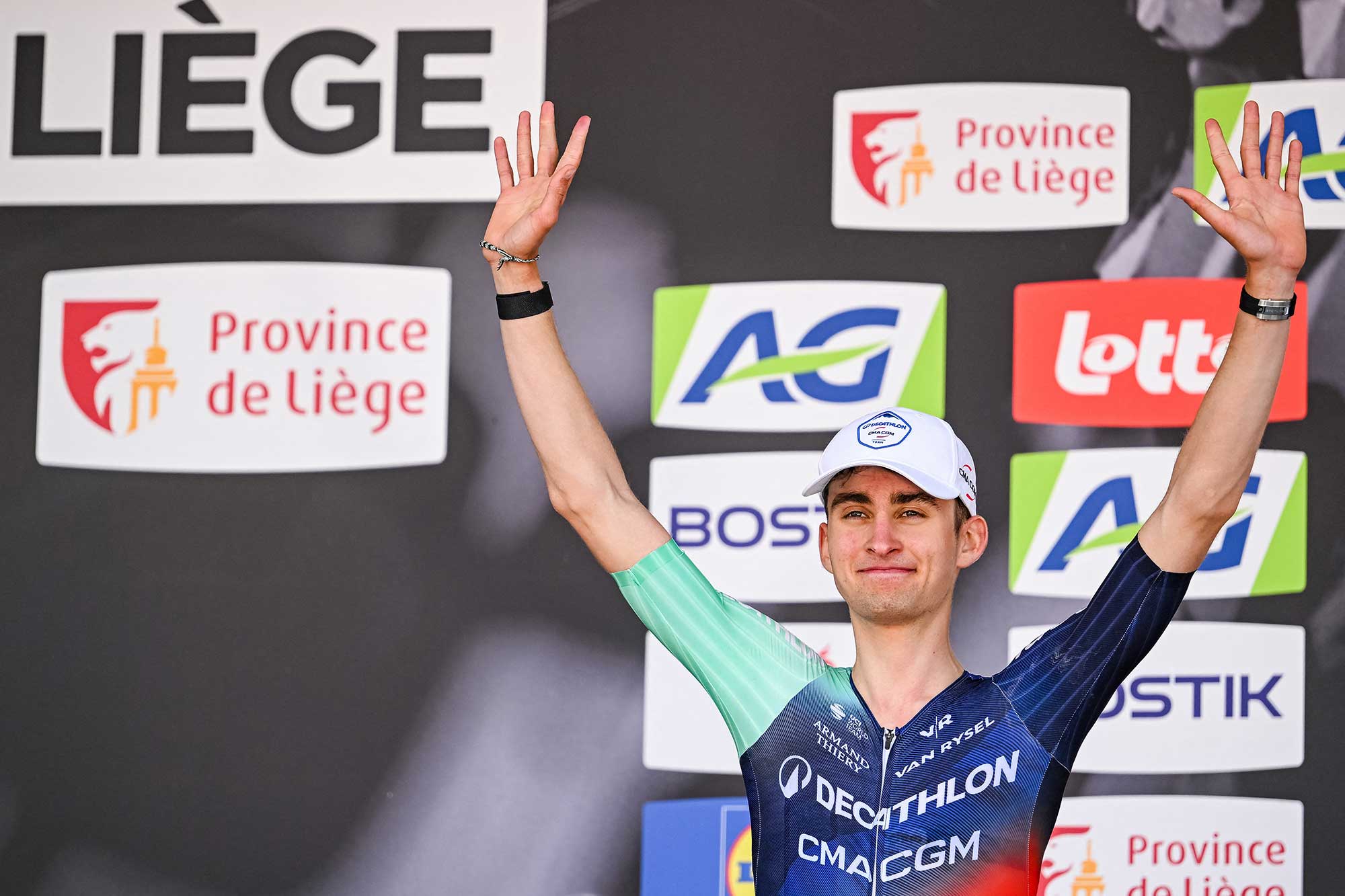 Paul Seixas celebrates his second place on the podium at the end of the men's elite race of the Liege-Bastogne-Liege UCI (Photo by MAARTEN STRAETEMANS / Belga / AFP via Getty Images) / Belgium OUT