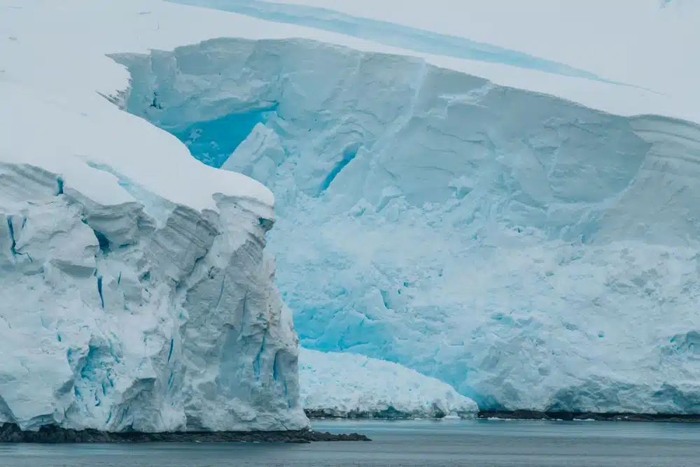 Beautiful,carved,ice,shelf,wall,in,antarctica.,view,from,ship