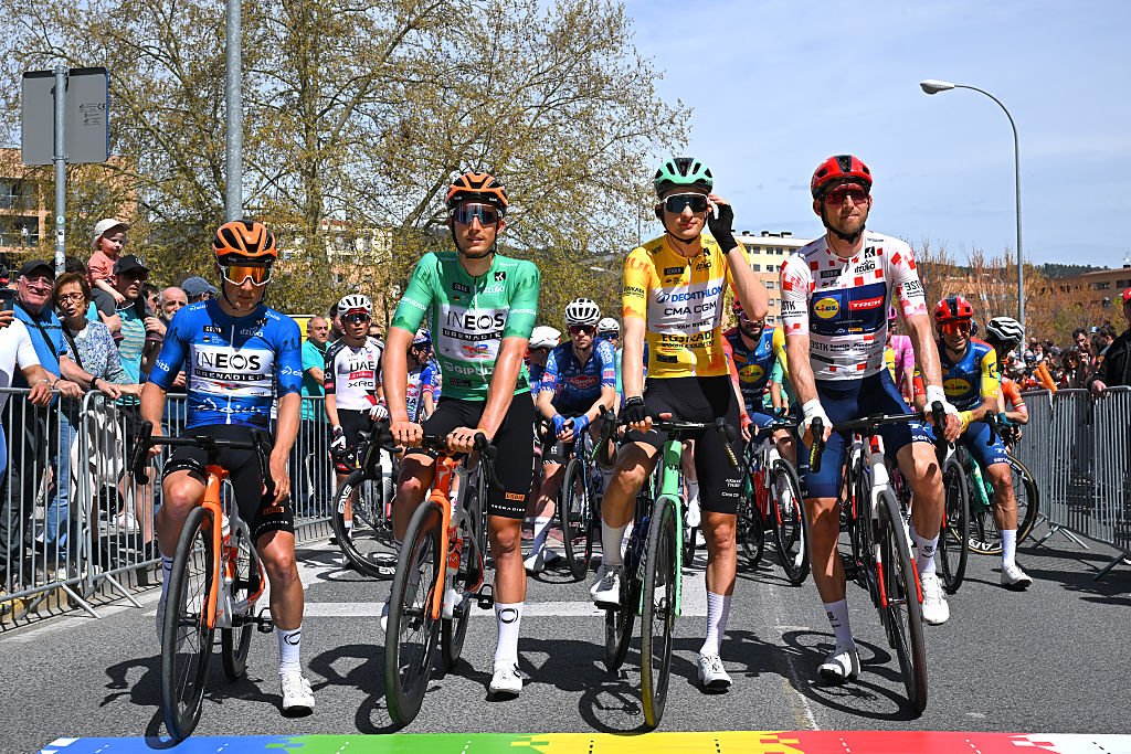 PAMPLONA-IRUNA, SPAIN - APRIL 07: (L-R) Andrew August of United States and Team INEOS Grenadiers - Blue Best Young Rider Jersey, Kevin Vauquelin of France and Team INEOS Grenadiers - Green Points Jersey, Paul Seixas of France and Team Decathlon CMA CGM - Yellow Leader Jersey and Bauke Mollema of Netherlands and Team Lidl - Trek - Polka Dot Mountain Jersey prior to the 65th Itzulia Basque Country 2026, Stage 2 a 164.1km from Pamplona-Iruna to Lekunberri 757m / #UCIWT / on April 07, 2026 in Pamplona-Iruna, Spain. (Photo by Tim de Waele/Getty Images)