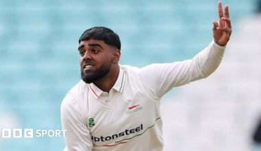 Rehan Ahmed in his follow through after delivering the ball during an over for Leicestershire
