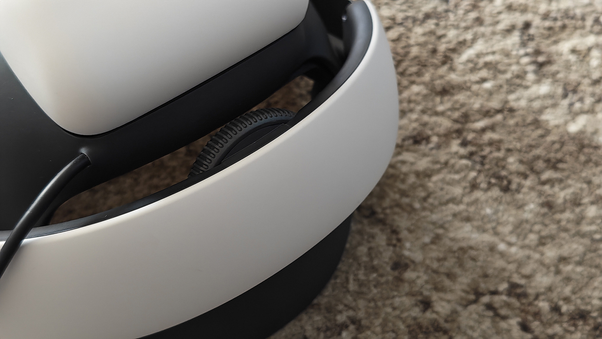 The adjustment wheel on a BoboVR S3 Pro installed on a Meta Quest 3 headset