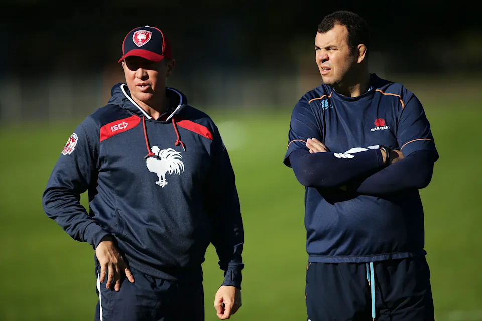 Pictured left to right, Roosters coach Trent Robinson and assistant Michael Cheika.