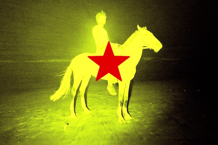 An album cover in yellow with a man on a horse and a red star at the centre of the page
