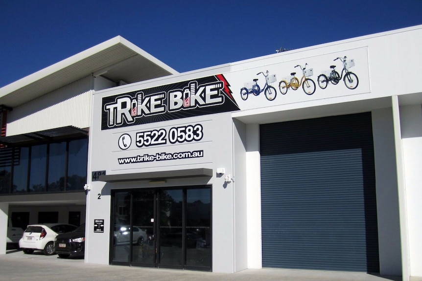 Outside of a trycicle store.