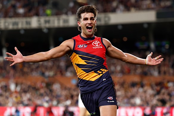 Talk about a purple patch: Crows star Josh Rachele celebrates a goal.