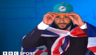 Uar Bernard, seen wearing a cropped black support vest over his upper chest