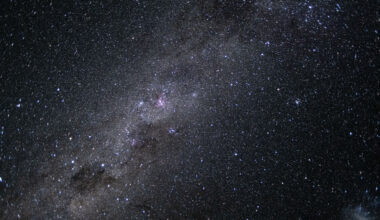 The Milky Way galaxy appears as many points of light dotting the blackness of space.