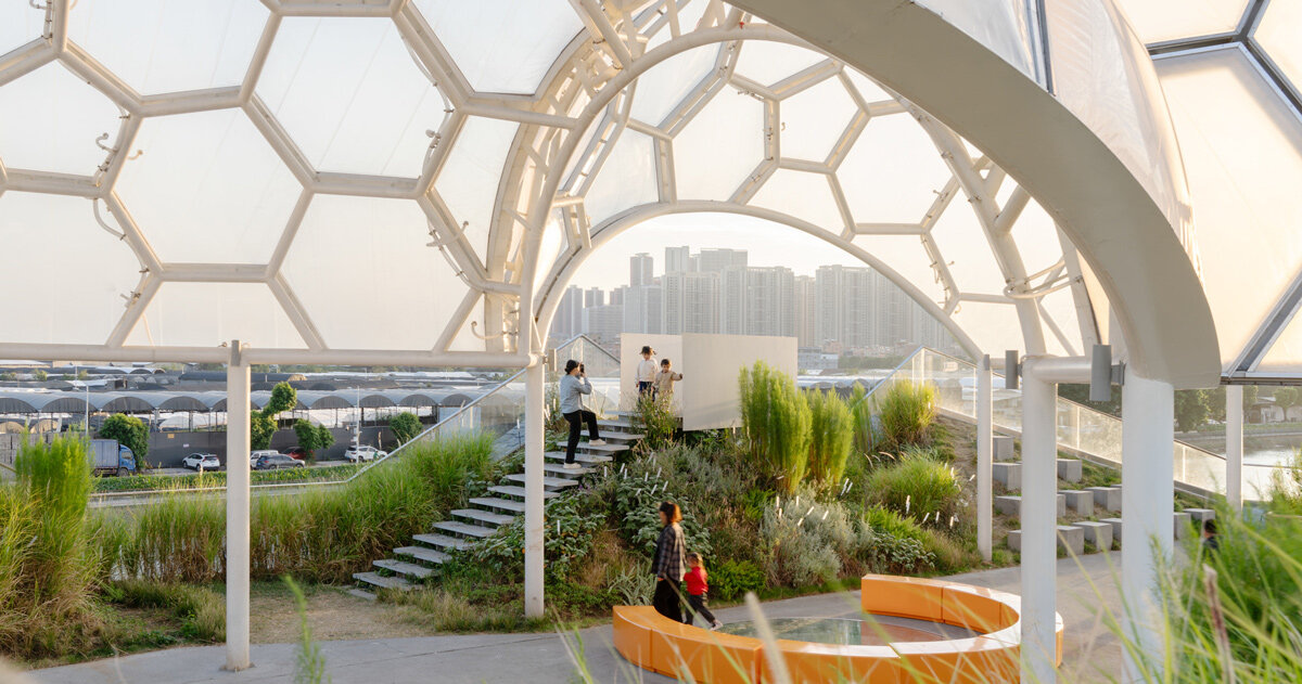 clustered canopies dot this rooftop park atop reworked warehouses