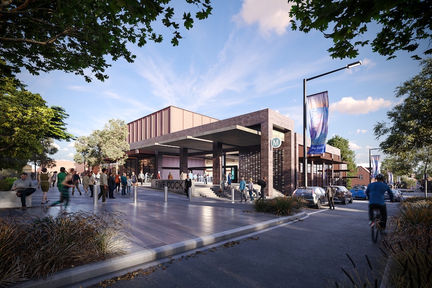Stairs leading up to the entry of Five Dock Metro West station which is made of light brown bricks.