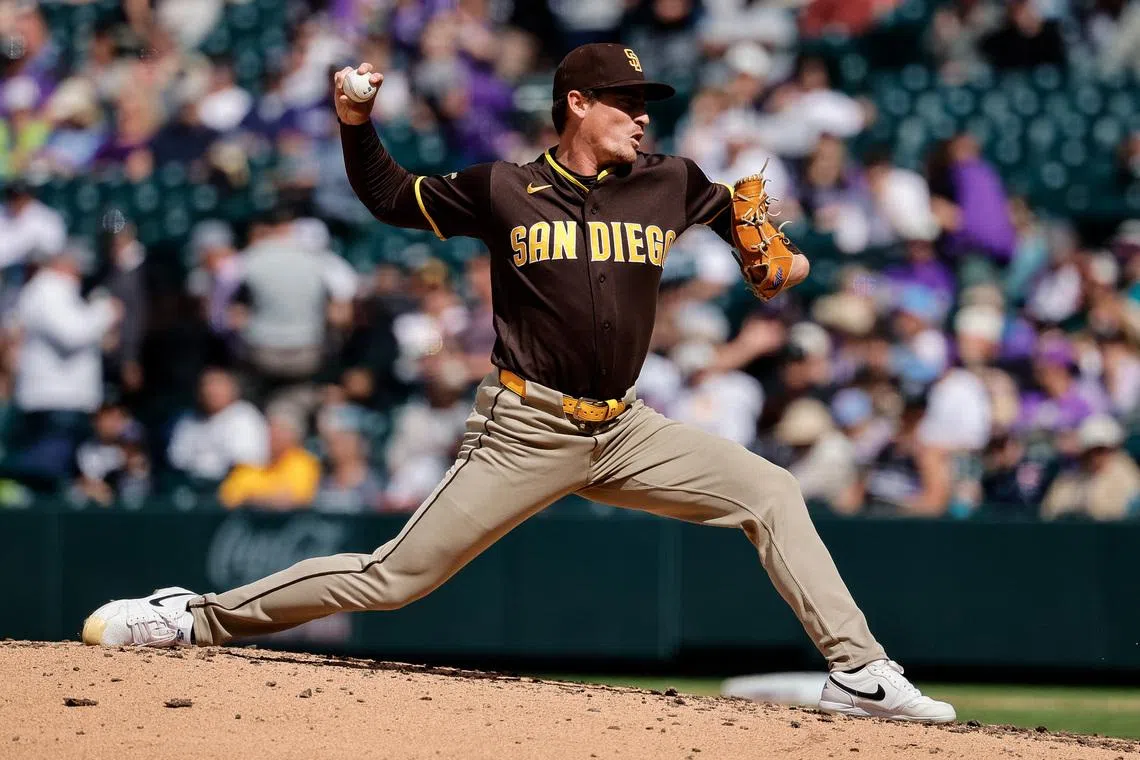 Apr 23, 2026; Denver, Colorado, USA; San Diego Padres relief pitcher Ron Marinaccio (97) pitches in the seventh inning against the Colorado Rockies at Coors Field. Mandatory Credit: Isaiah J. Downing-Imagn Images