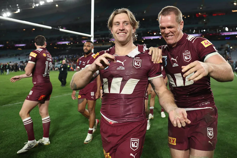 Pictured centre, Maroons Origin captain Cameron Munster.