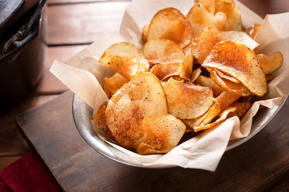 Stock photo of a bowl of potato chipsCredit: Getty