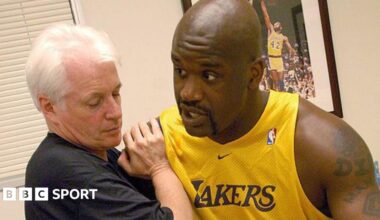 Alex McKechnie doing some physio with Shaquille O'Neal