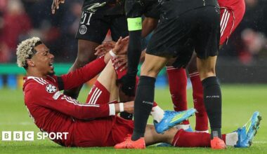 Hugo Ekitike looks in pain after suffering an injury