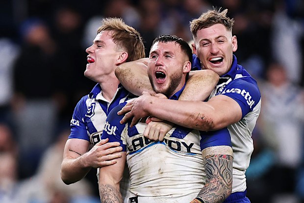 Bronson Xerri of the Bulldogs scores a try.