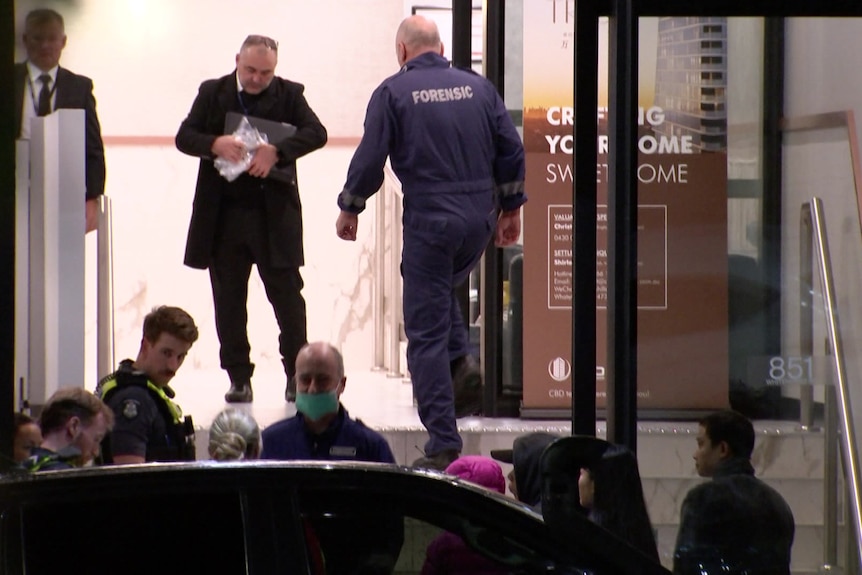 Forensic services arriving at a Box Hill tower.