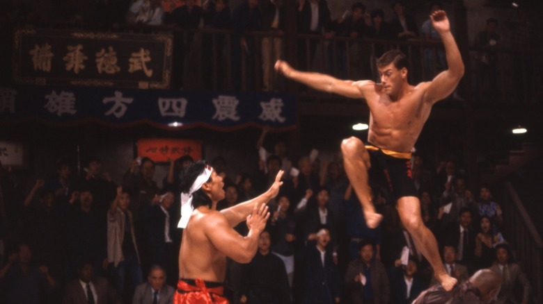 Frank leaps and prepares to kick Chong Li in 